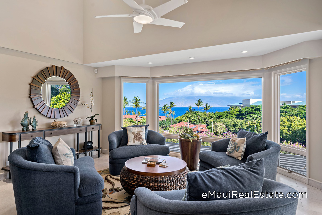 Bay windows int he living room enhance the ocean views at Wailea Point