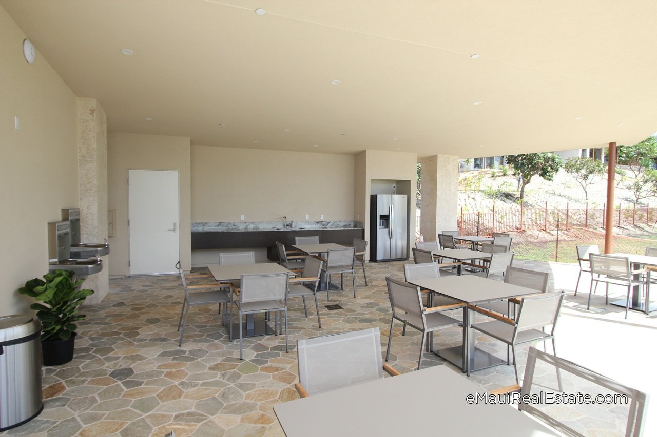 The club house at Makalii has a large covered outdoor entertainment area with ample seating and amenities