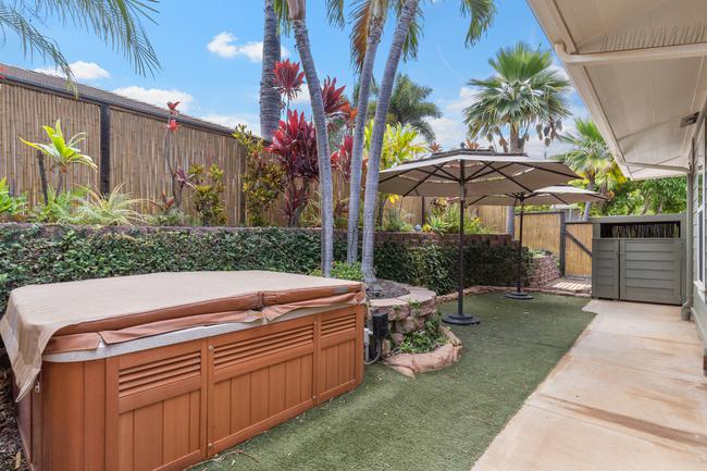 Hot tub in the East side yard